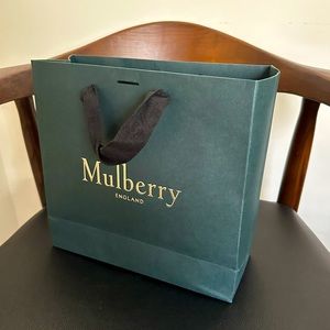 3 Mulberry gift bags and 1 gift box with tissue paper